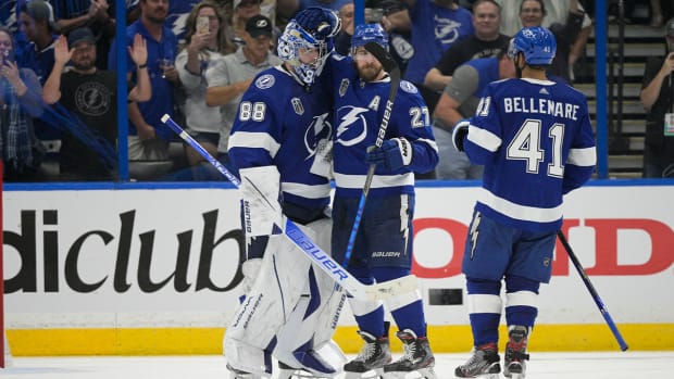 Tampa Bay Lightning goaltender Andrei Vasilevskiy (88) celebrates with Tampa Bay Lightning defenseman Ryan McDonagh (27) after Game 3 of the NHL hockey Stanley Cup Final against Colorado Avalanche on Monday, June 20, 2022, in Tampa, Fla.